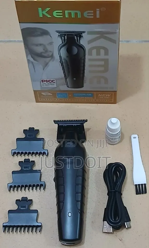 Kemei 2299 Rechargeable Hair Trimmer / Shaver · Photo 1