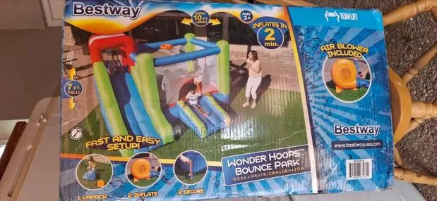 Wonder Hoops Kids Inflatable Mega Bounce Park, 7' Tall X 10' Long · Photo 2
