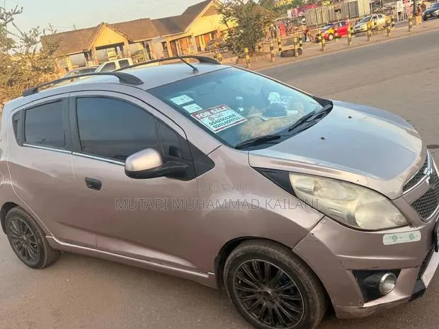 Chevrolet Spark 1LT 4dr Hatchback (1.2L 4cyl 5M) 2015 Beige · Photo 1
