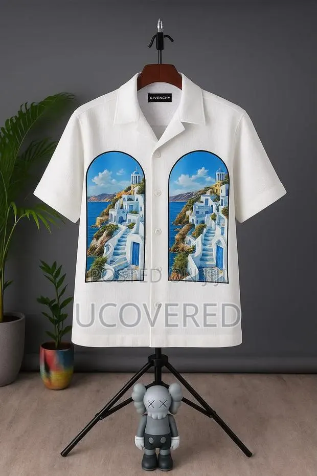 White Short-Sleeved Button-Up Shirt · Photo 1