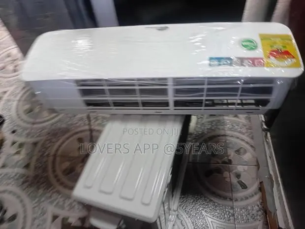 1.5hp Rainbow Titan White Ac- Incredible Window Cooling. · Photo 1