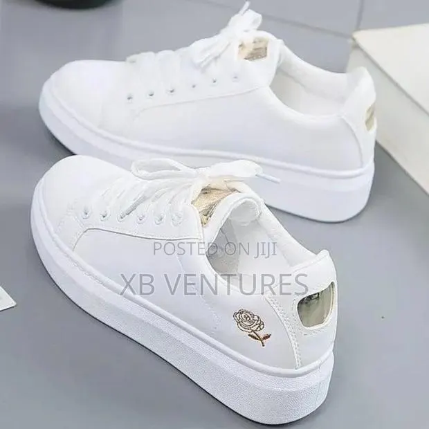 Sole Culture Pure White Low-Top Sneakers · Photo 1