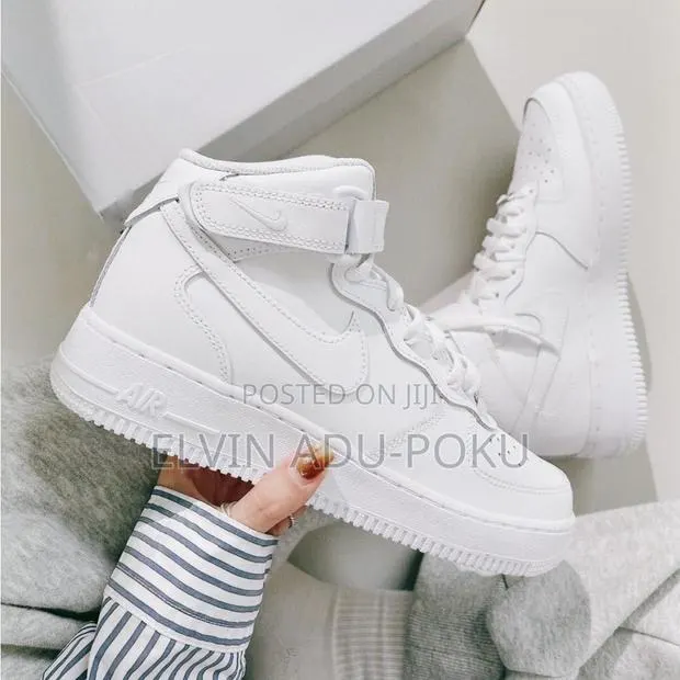 Nike Air Force 1 High "Triple White" Sneakers · Photo 1