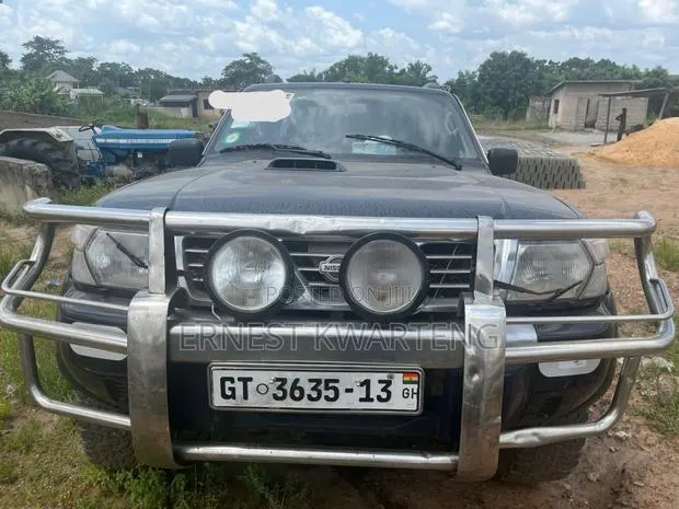 Nissan Patrol 2009 Black · Photo 1