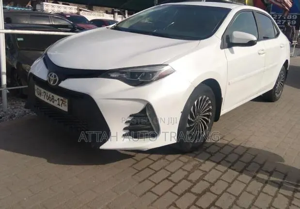 Toyota Corolla 2015 White · Photo 1