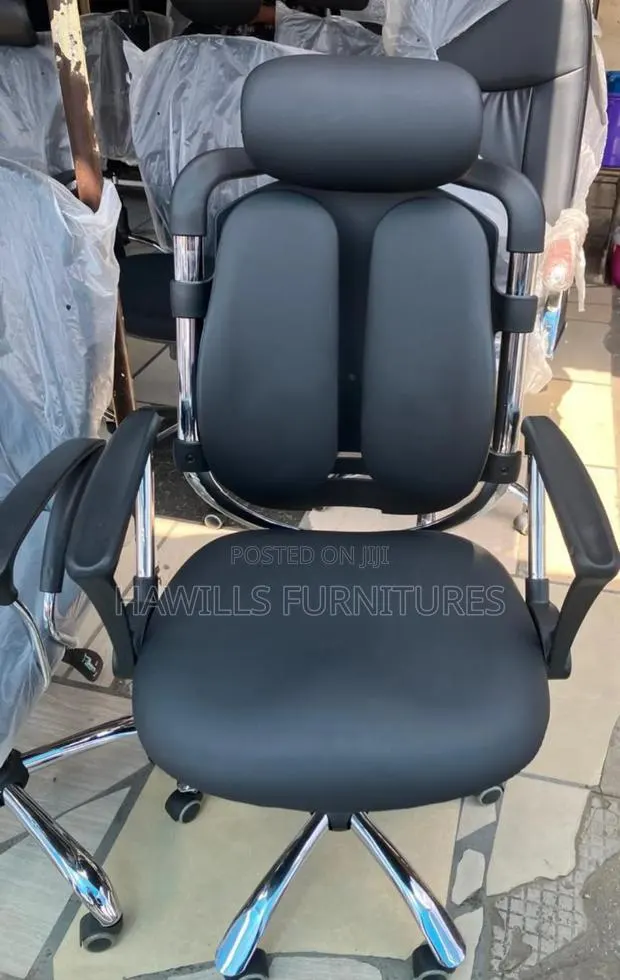 Black Orthopedic Chair for Back Massager · Photo 1