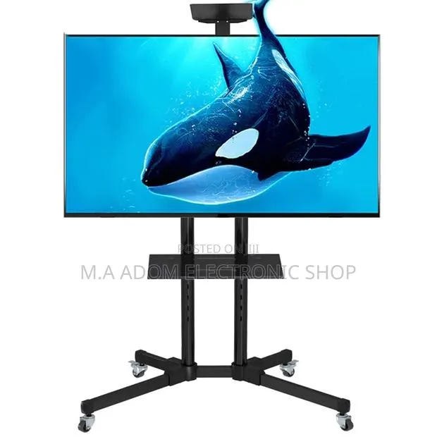 Mobile Tv Stand With Rolling Wheels 33”-70” · Photo 1