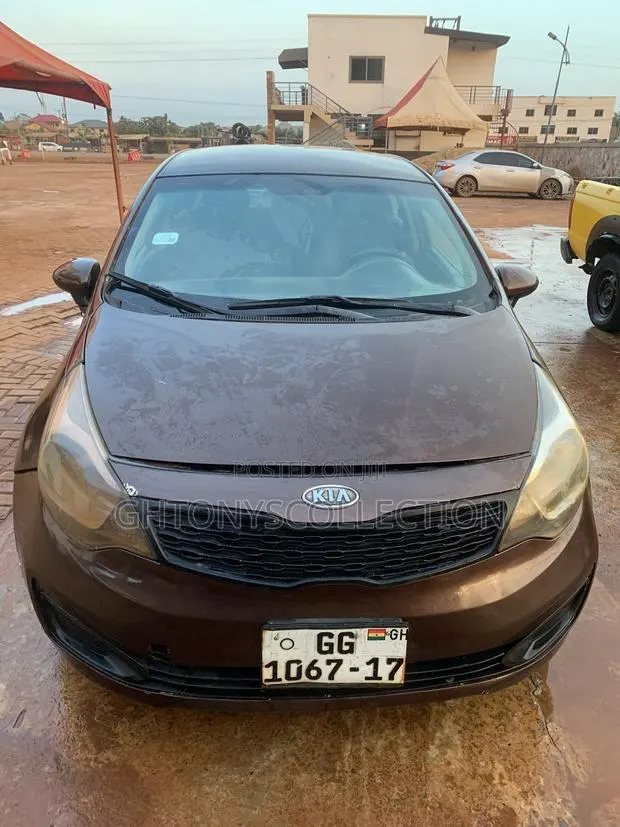 Kia Rio LX 4dr Sedan (1.6L 4cyl 6M) 2013 Brown · Photo 1
