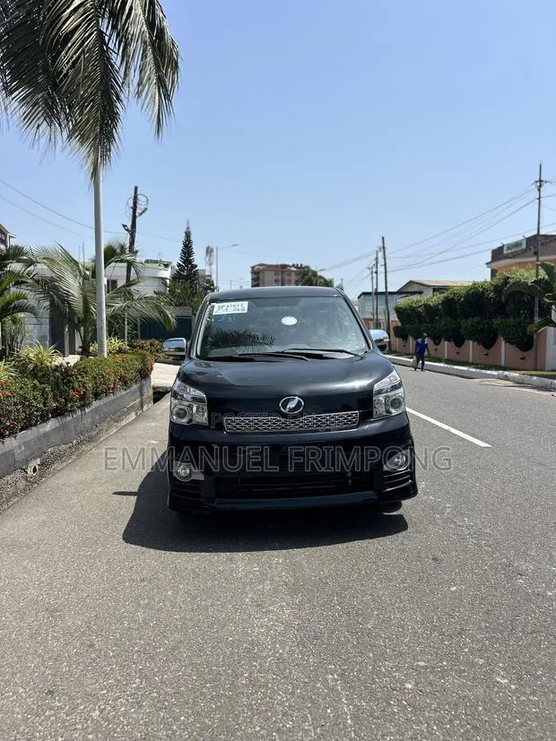 Toyota Voxy ZS 4WD 8-Seater 2013 Black · Photo 1