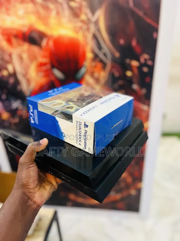 Ps4 Fat With Loaded Games and 2 Controllers Available · Photo 1