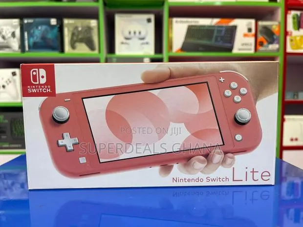Nintendo Switch LITE Coral Plus 64gb SD · Photo 1