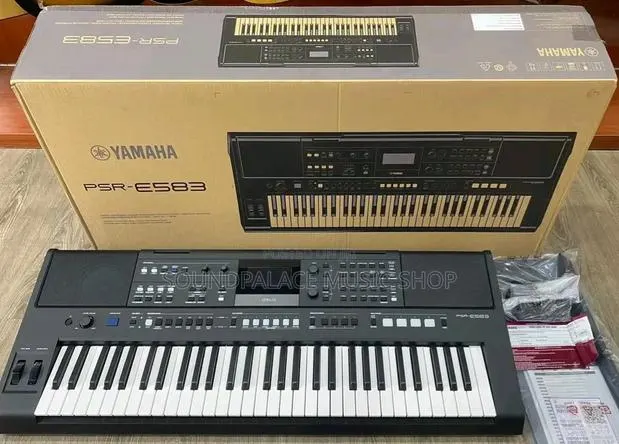 Yamaha PSR-E583 61-Key Portable Electronic Keyboard · Photo 1