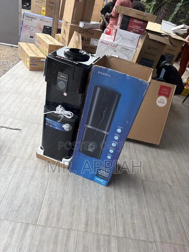 Compressor Cooling Midea 16liters Electric Water Dispenser. · Photo 1