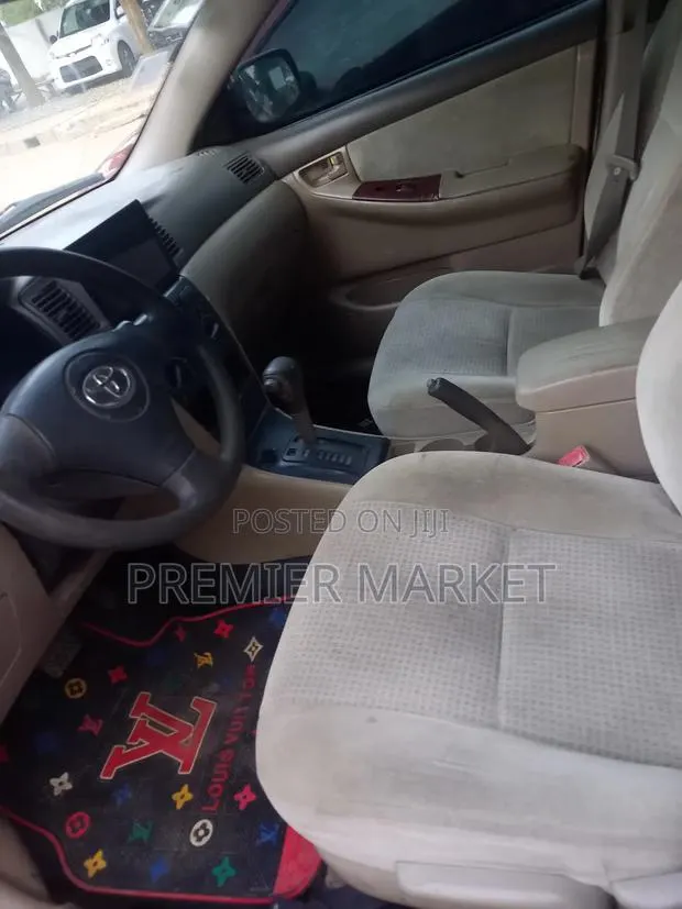 Toyota Corolla CE 2007 Red · Photo 4