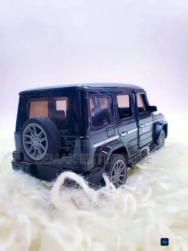 A Black Toy Police Suv For Kids · Photo 1