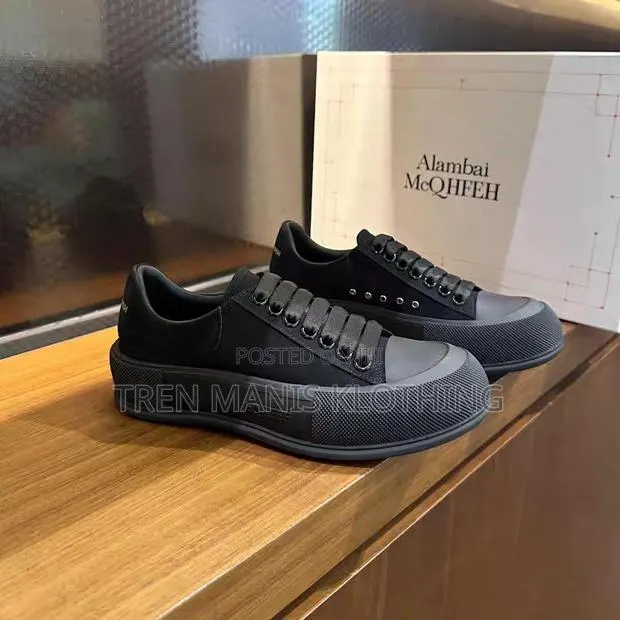 Alexander McQueen All Black Sneakers · Photo 1