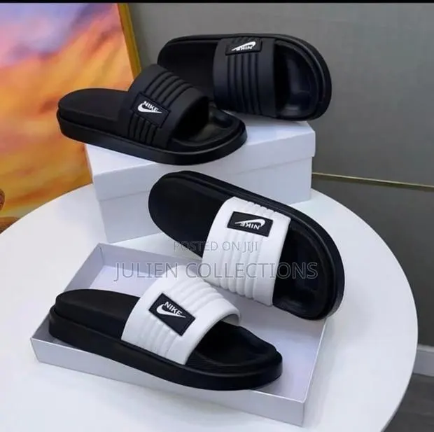 Nike Porta Slide Black White · Photo 1