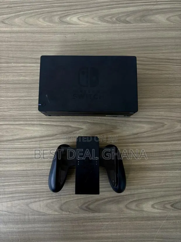 Nintendo Switch Original Dock And Joy Con Grip · Photo 1