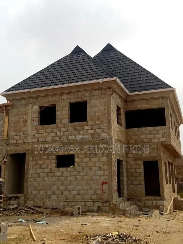 Roof Once, Relax for 50 Years. · Photo 1