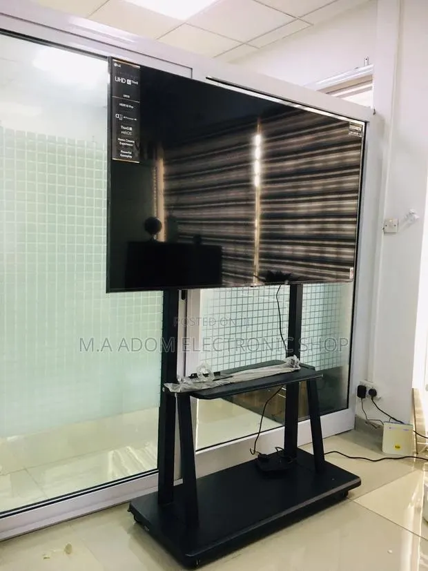 Heavy Duty TV Stand W/ Wheels 70"-100" · Photo 1