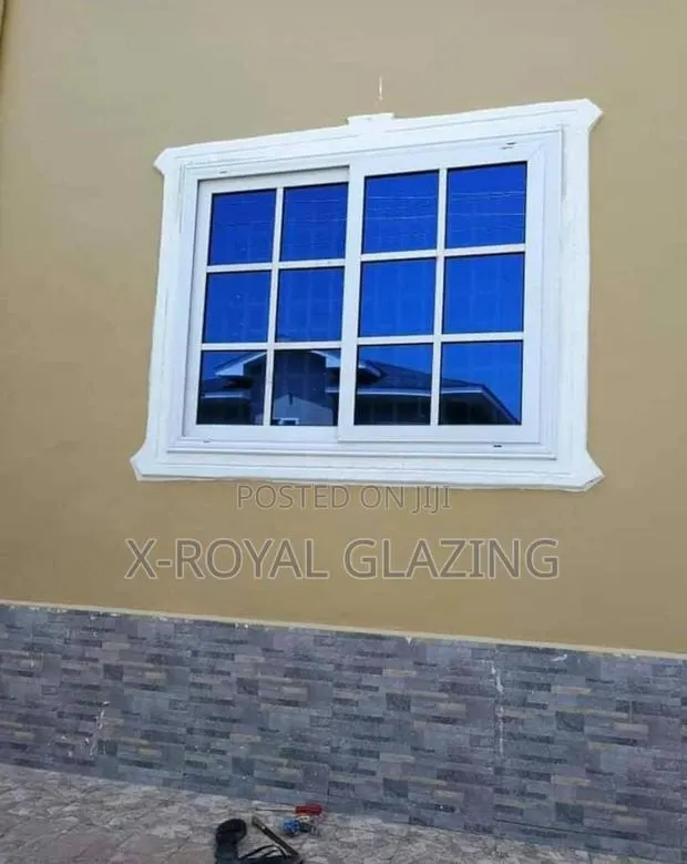 White Divisions With Blue Glass Sliding Windows · Photo 1