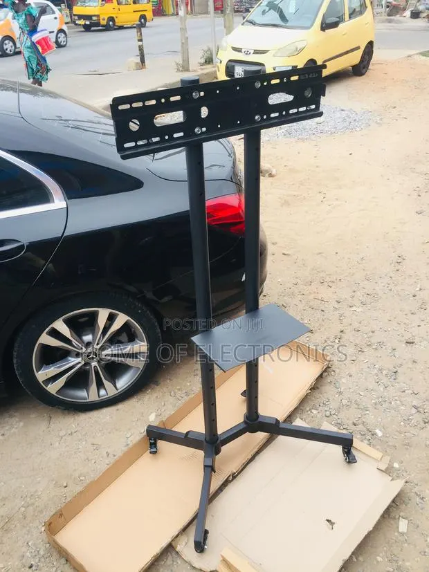 With Shelf Movable Trolley TV Stand + Wheels(32-70) · Photo 1