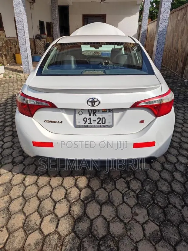 Toyota Corolla 2014 White · Photo 1