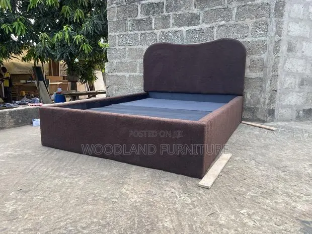 Stylish Upholstered Double Bed Frame With Curved Headboard · Photo 1