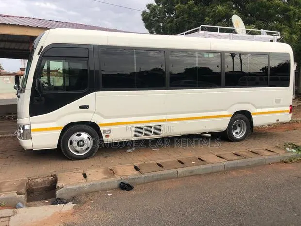 Car Rental-' a New Coaster Bus for Rent- 30 Passengers Bus · Photo 1