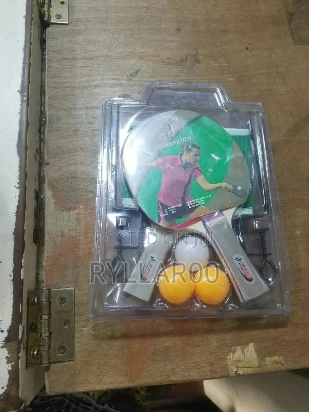 Table Tennis Bat And Balls · Photo 1