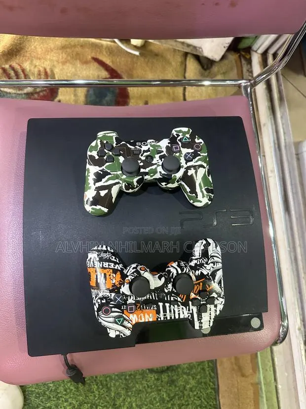 Ps3 Slim Loaded With Games and Two Pads · Photo 1