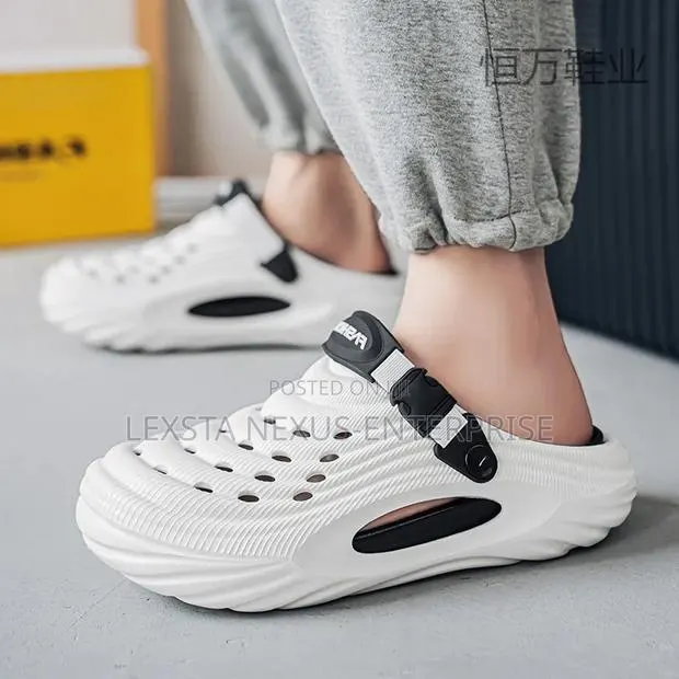 White Crocs/Slippers · Photo 1