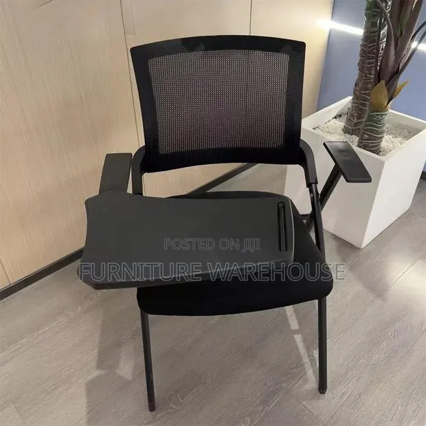 Ergonomic Mesh Training Chair With Foldable Writing Tablet Arm. · Photo 1