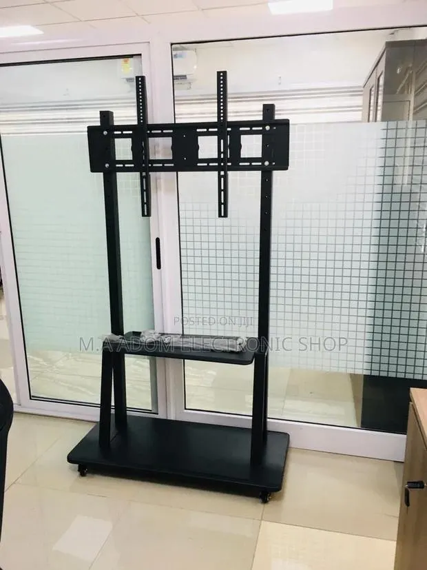 Mobile TV Cart for 60"-100" TVS - Easy Mobility Viewing · Photo 1
