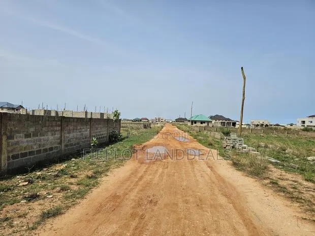 Full Plot (70x100) for Sale at SkyPort City, Tsopoli – No Flooding · Photo 1