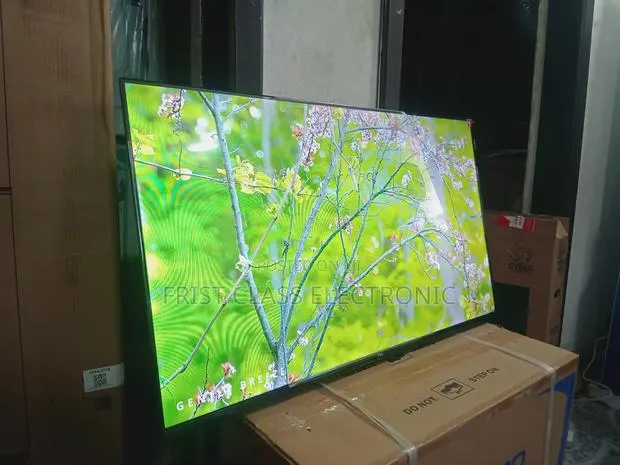 TCL 43-Inch Qled Smart Tv, Tv That Turns Your Room Into Luxury Glow · Photo 1