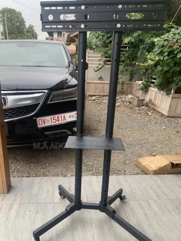 Fabulous Moveable Tv Trolly for 32-70” Television(Black). · Photo 1
