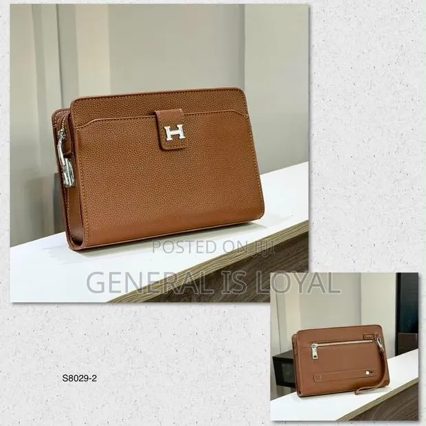 Hermes Brown Leather Men’s Lock Purse · Photo 1