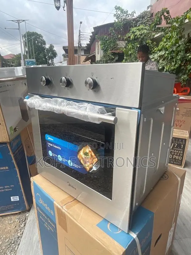 Midea 90cm Stainless Steel Built-in Oven · Photo 1