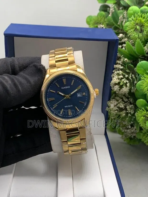 Gold-Tone Casio Analog Watch · Photo 1
