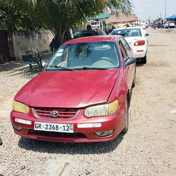 Toyota Corolla 2003 Red · Photo 1