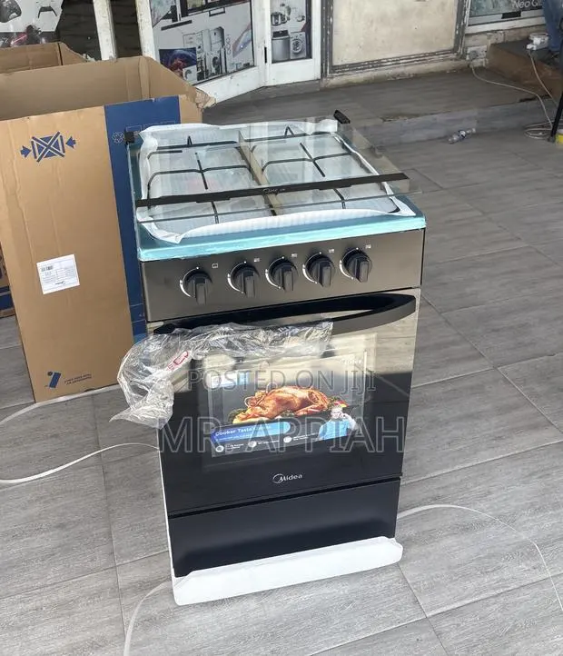 Adorable Midea 4 Gas Burner With Oven Grill(Black) · Photo 1
