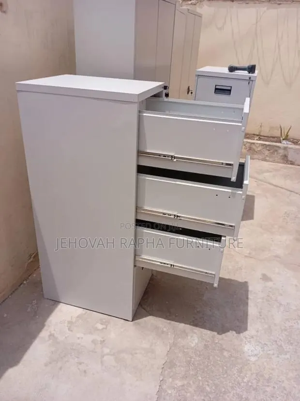 Office Four Drawer Cabinet With Keys · Photo 1