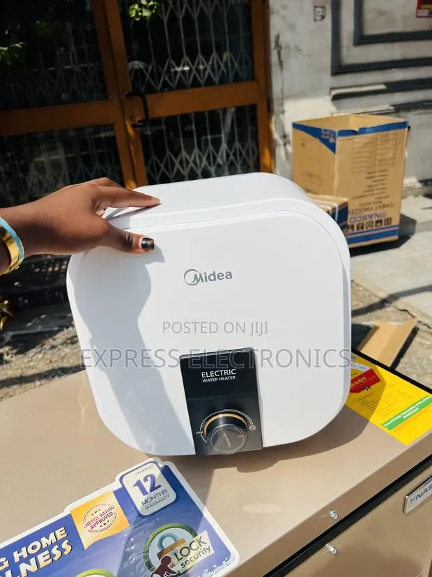 Amazing Deals on White Midea 15l Water Heater · Photo 1