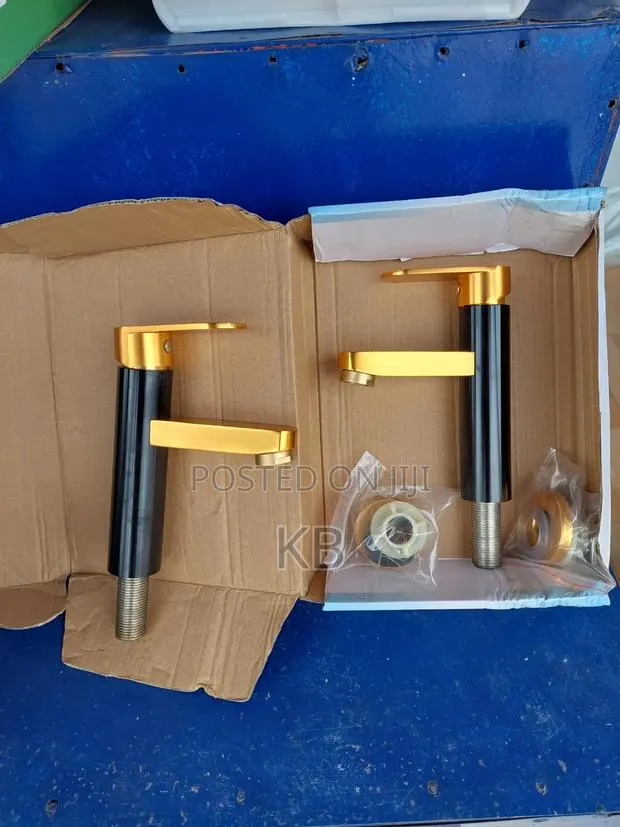 Black and Gold Single-Levee Basin Taps · Photo 1