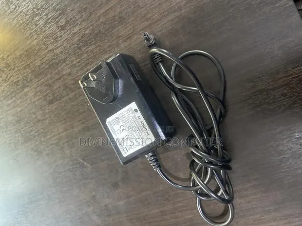 Ac Adapter 13.5v~~4.0a · Photo 1