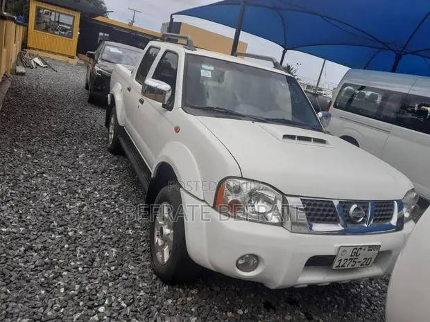 Nissan Navara 2014 White · Photo 1