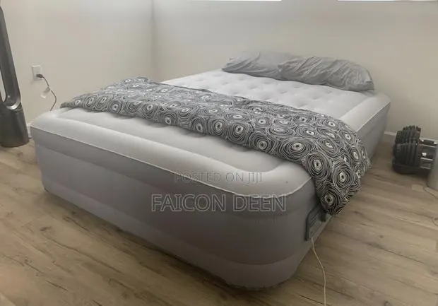 Experience Superior Rest; Double Automatic Inbuilt Pump Double Air Bed · Photo 1