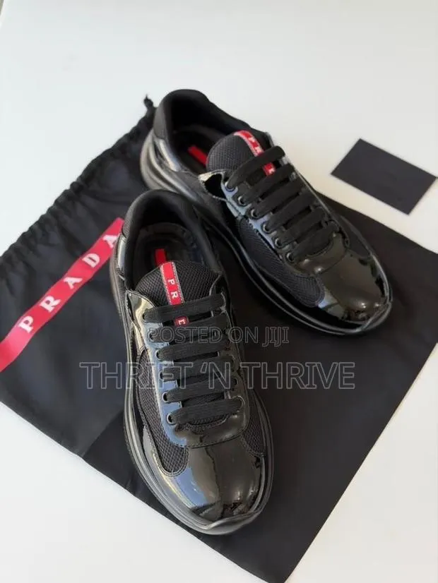 All Black Patent Leather Prada America's Cup Low-Top Sneakers · Photo 1