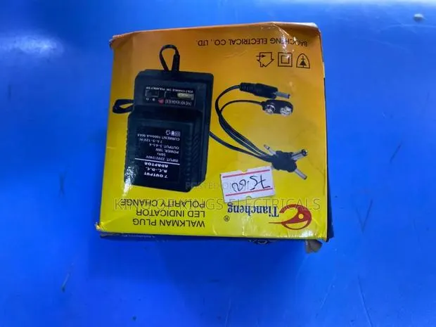 Trancheng Universal Plug Adapter Charger–Led Indicator Polarity Change · Photo 1